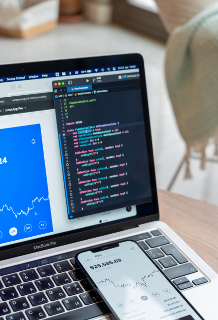 Laptop with code and phone